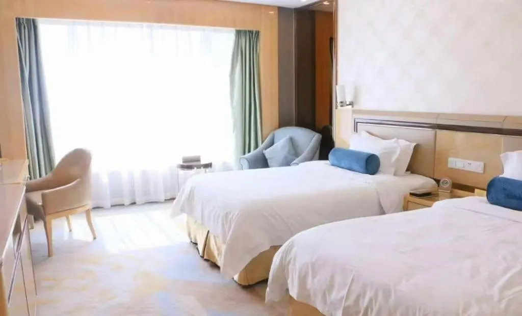 Bed in Shanghai Fuyue Hotel