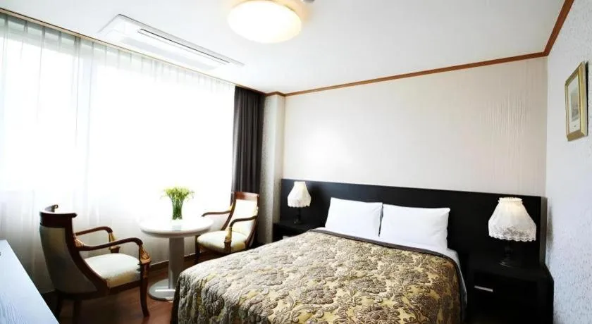 Bed in Danyang tourist hotel Edelweiss