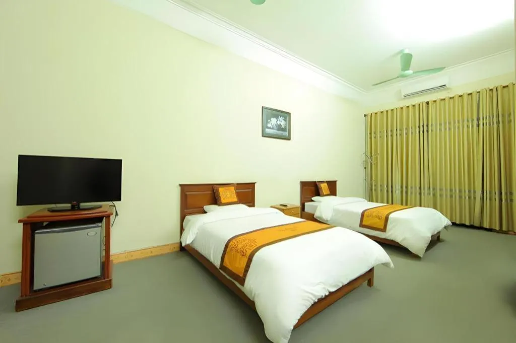 Bed in Khan Quang Do Hotel