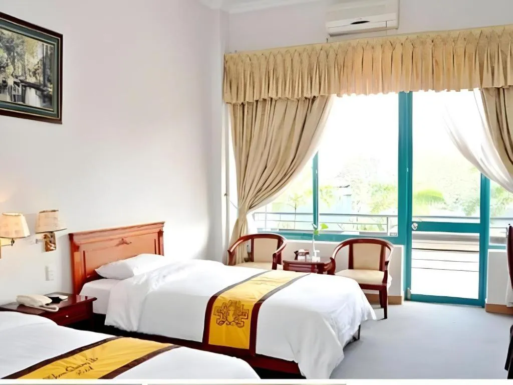 Bed in Khan Quang Do Hotel