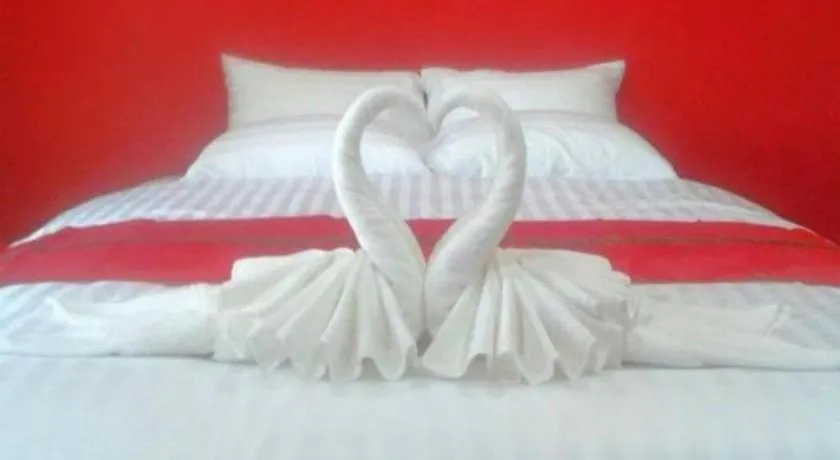 Bed in Sawasdee River Kwai Lodge