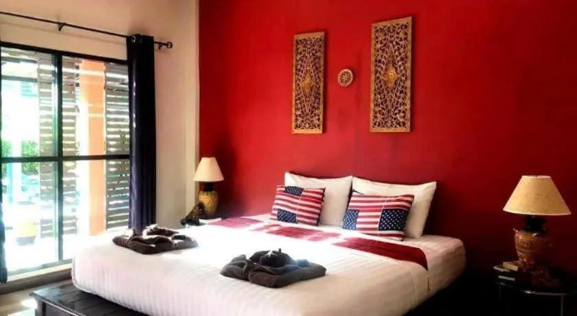 Bed in Sawasdee River Kwai Lodge