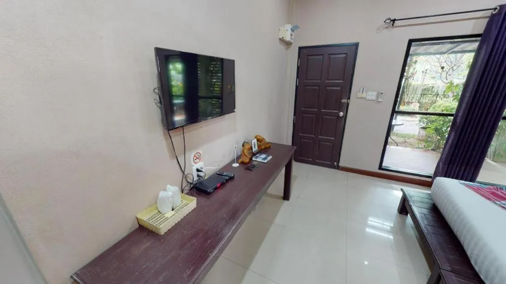 Bed in Sawasdee River Kwai Lodge