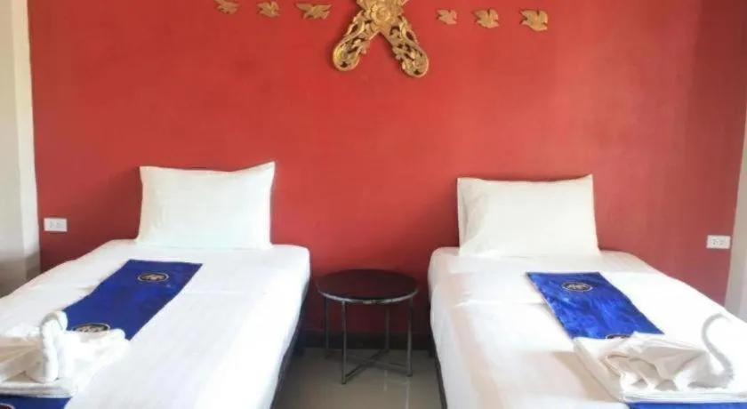 Bed in Sawasdee River Kwai Lodge