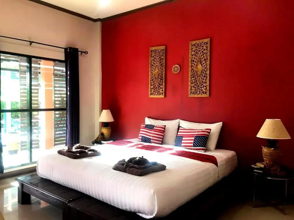 Bed in Sawasdee River Kwai Lodge