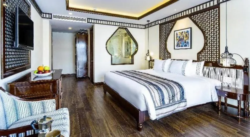 Bed in Le Pavillon Hoi An Paradise Hotel & Spa