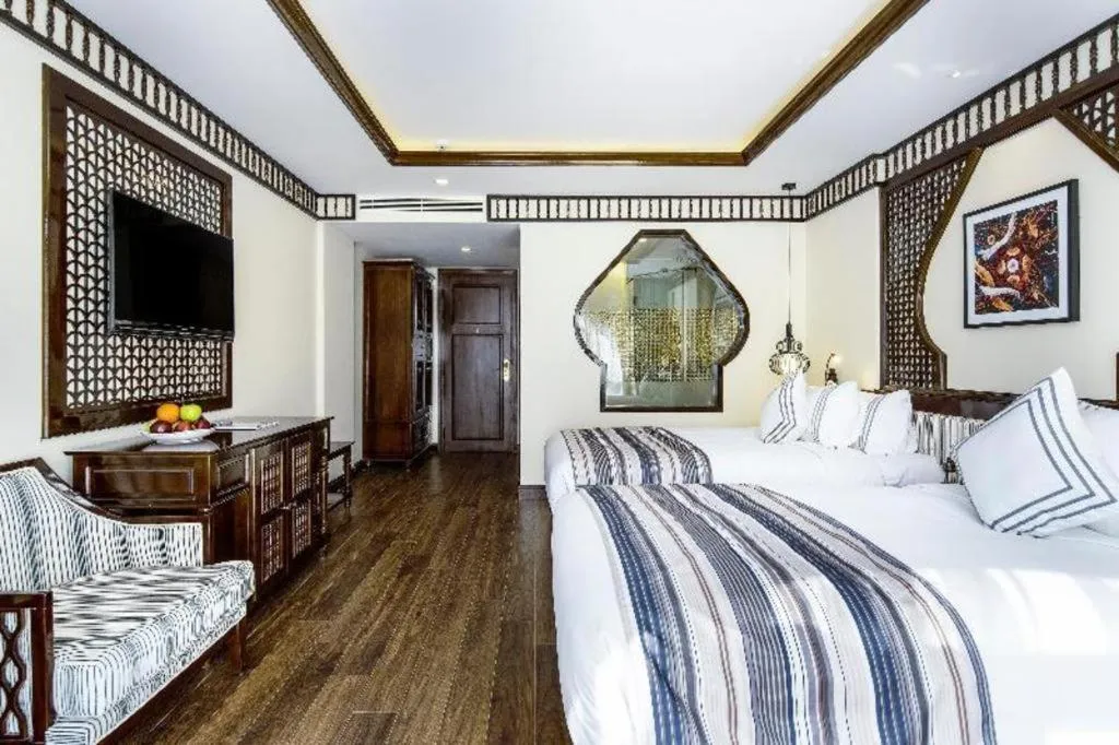 Bed in Le Pavillon Hoi An Paradise Hotel & Spa