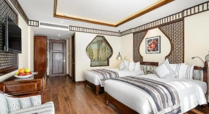 Bed in Le Pavillon Hoi An Paradise Hotel & Spa