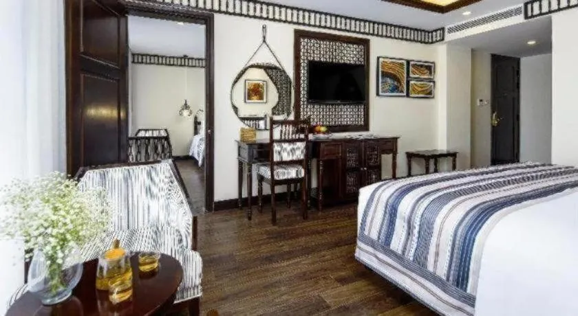 Bed in Le Pavillon Hoi An Paradise Hotel & Spa