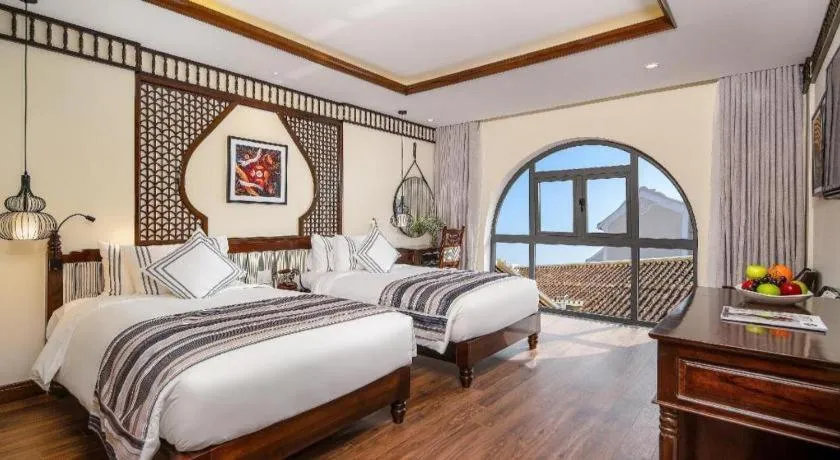 Bed in Le Pavillon Hoi An Paradise Hotel & Spa