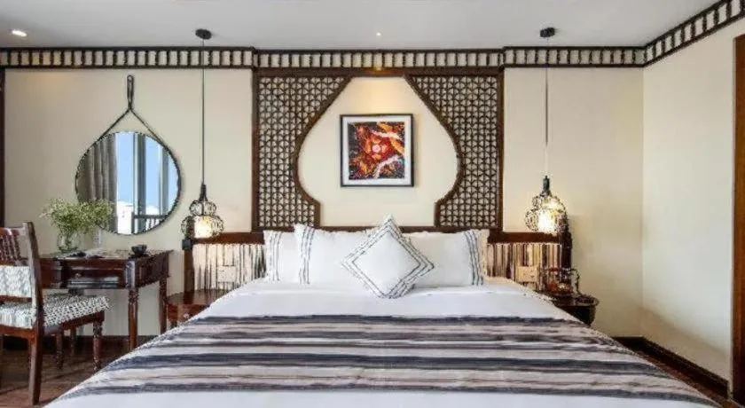 Bed in Le Pavillon Hoi An Paradise Hotel & Spa