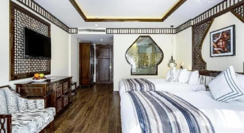 Bed in Le Pavillon Hoi An Paradise Hotel & Spa