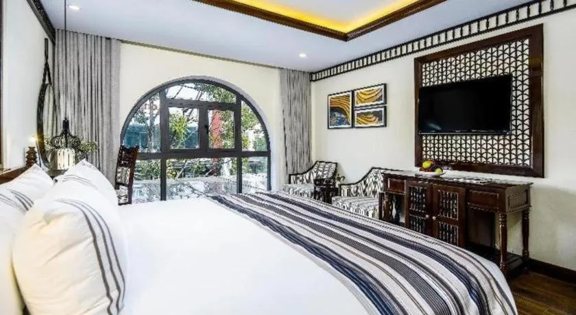 Bed in Le Pavillon Hoi An Paradise Hotel & Spa