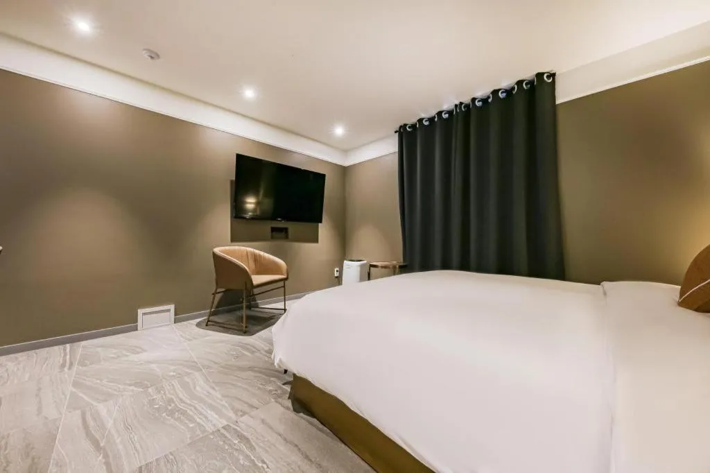 Bed in Cheongju Maryjane Hotel