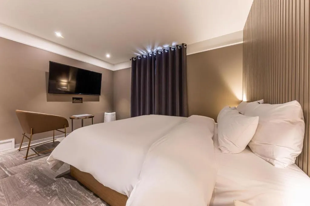 Bed in Cheongju Maryjane Hotel