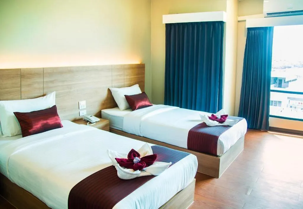 Bed in ATK HATYAI HOTEL