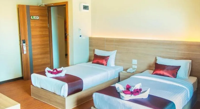 Bed in ATK HATYAI HOTEL