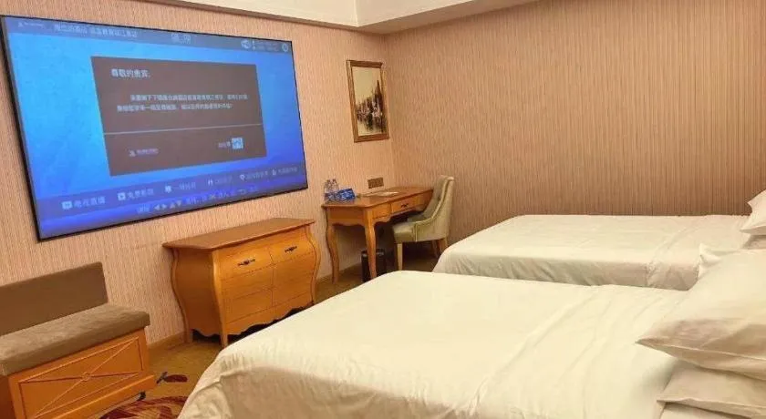 Bed in Vienna Hotel Guangdong Xinyi Jiaoyucheng River View