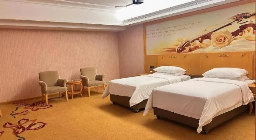 Bed in Vienna Hotel Guangdong Xinyi Jiaoyucheng River View
