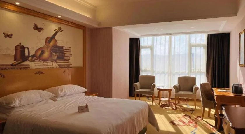 Bed in Vienna Hotel Guangdong Xinyi Jiaoyucheng River View