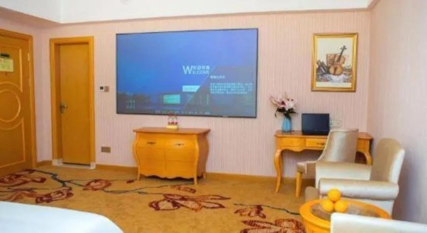 Bed in Vienna Hotel Guangdong Xinyi Jiaoyucheng River View