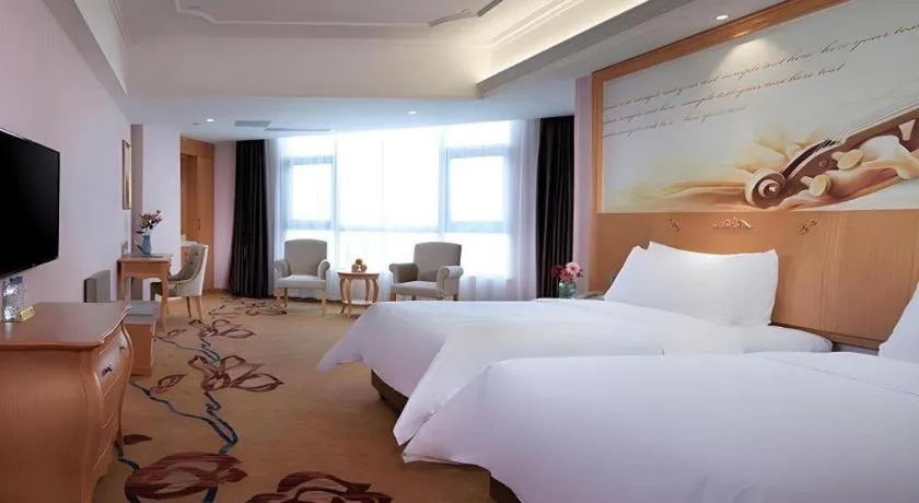 Bed in Vienna Hotel Guangdong Xinyi Jiaoyucheng River View