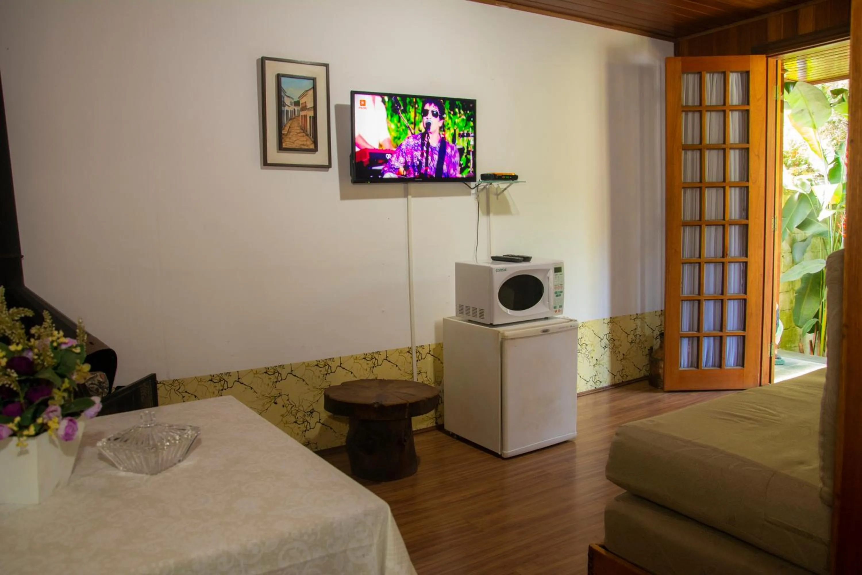 Living room in Pousada Recanto Ninho Verde Chalés