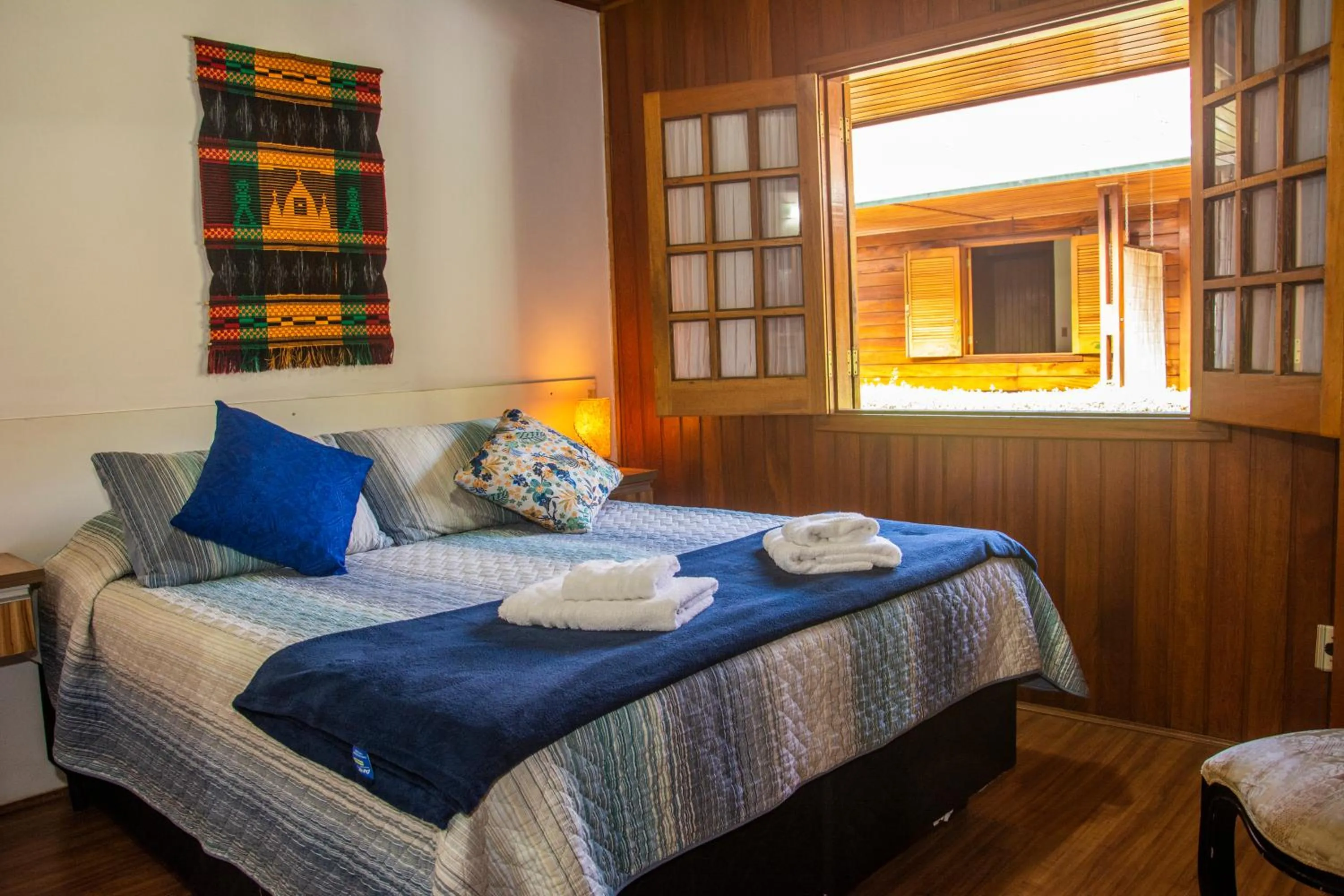 Bed in Pousada Recanto Ninho Verde Chalés