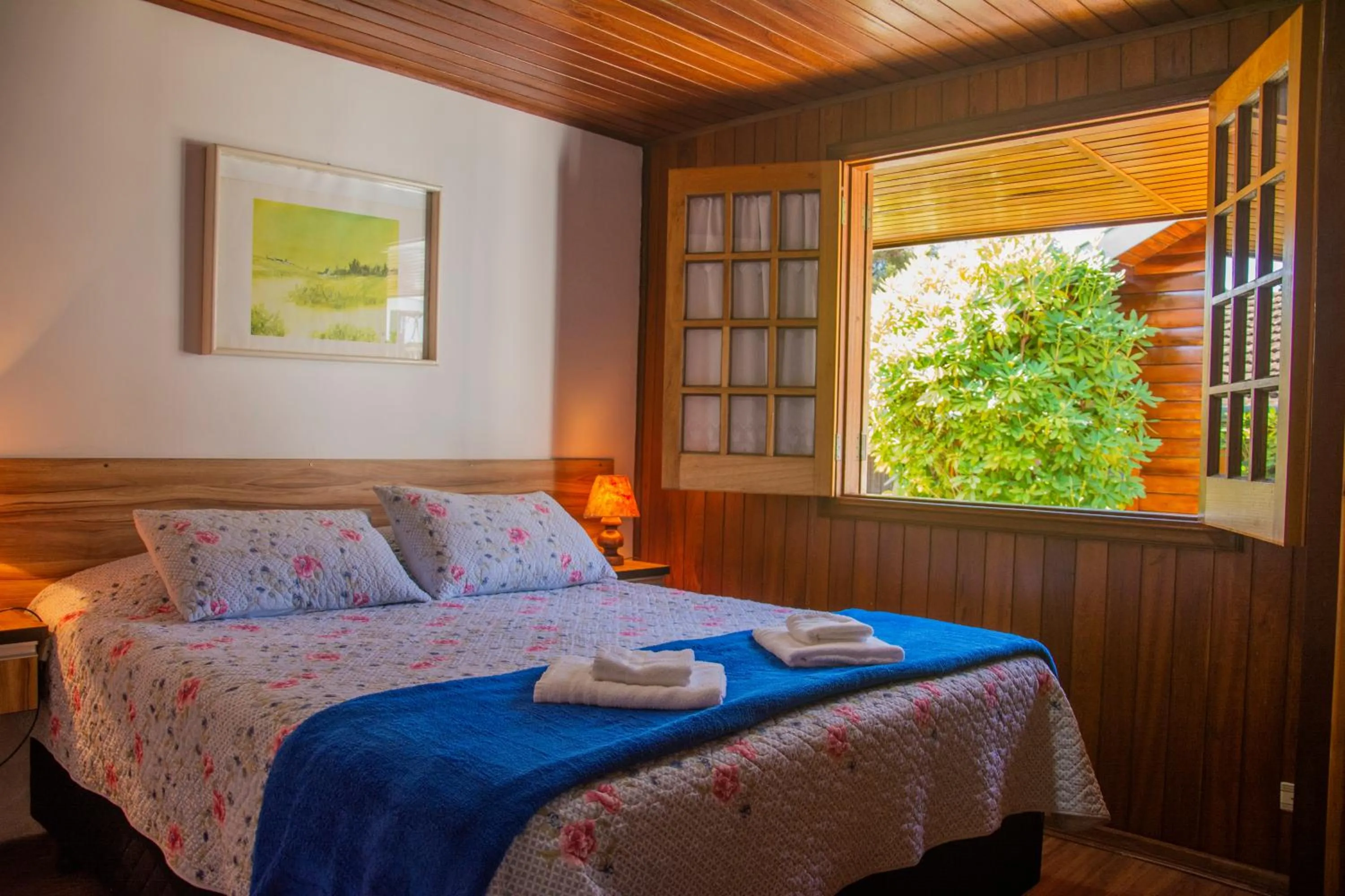 Bed in Pousada Recanto Ninho Verde Chalés