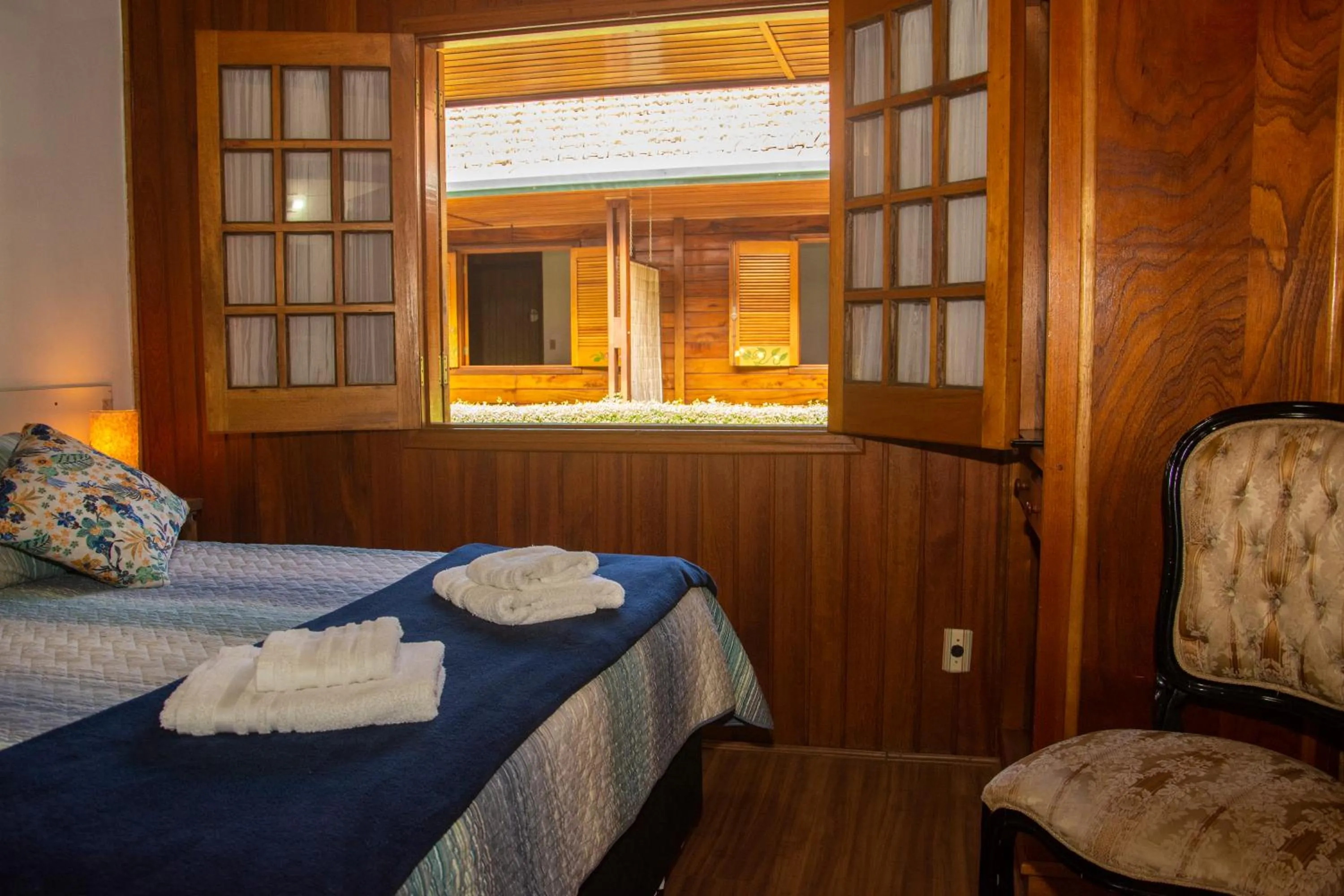 Bed in Pousada Recanto Ninho Verde Chalés