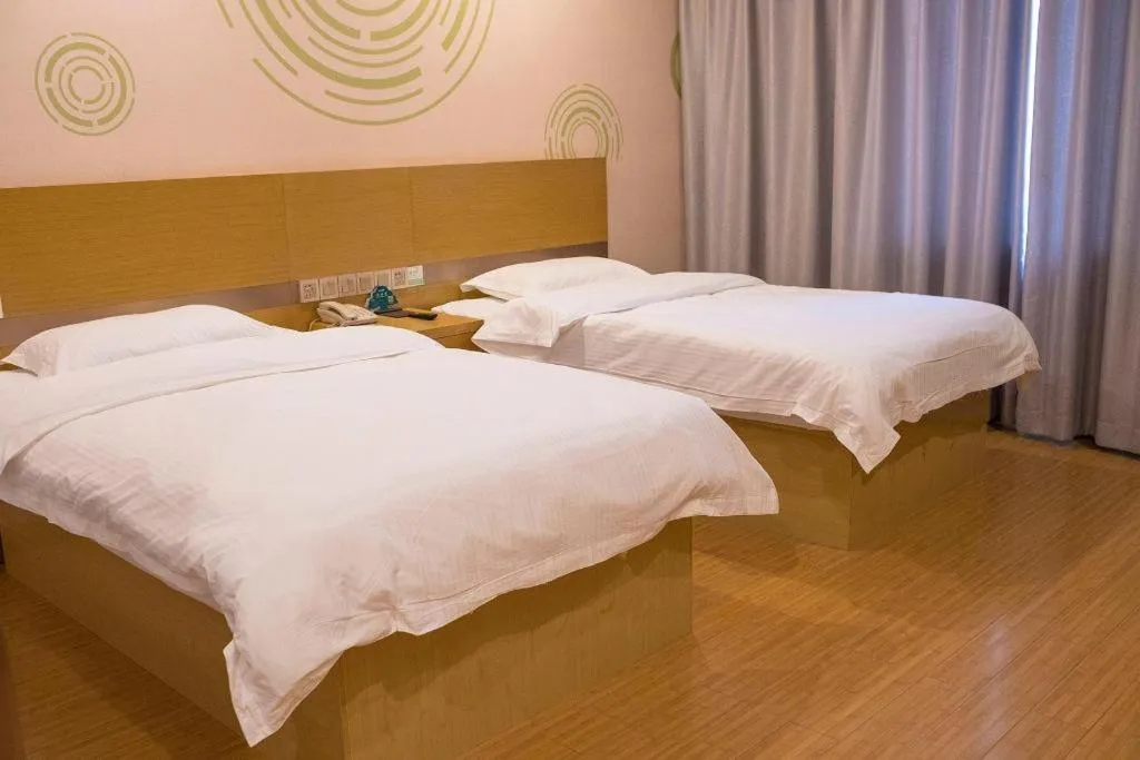 Bed in GreenTree Inn Qingdao Jiaozhou Jiaoping Road Express Hotel