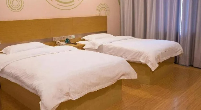 Bed in GreenTree Inn Qingdao Jiaozhou Jiaoping Road Express Hotel