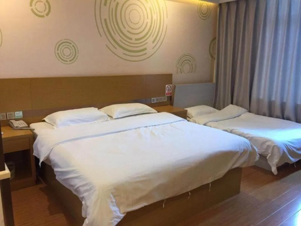 Bed in GreenTree Inn Qingdao Jiaozhou Jiaoping Road Express Hotel
