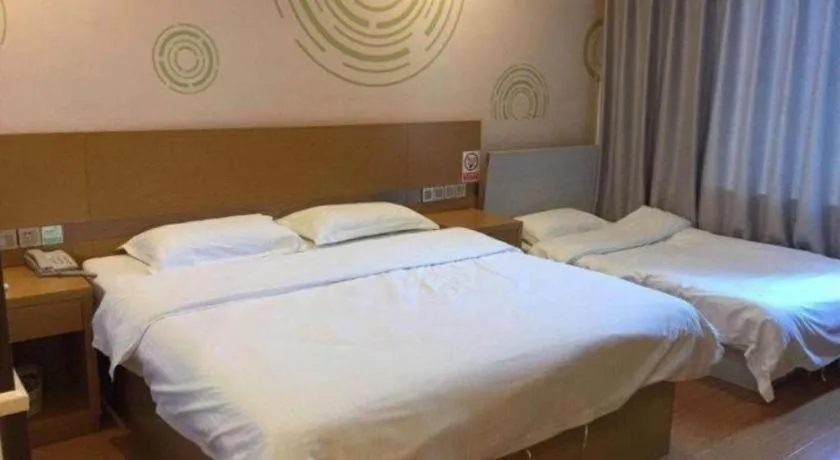 Bed in GreenTree Inn Qingdao Jiaozhou Jiaoping Road Express Hotel