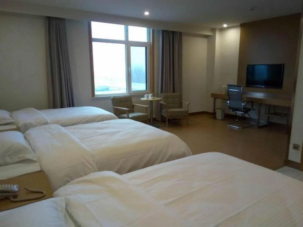 Bed in GreenTree Inn Qingdao Jiaozhou Jiaoping Road Express Hotel