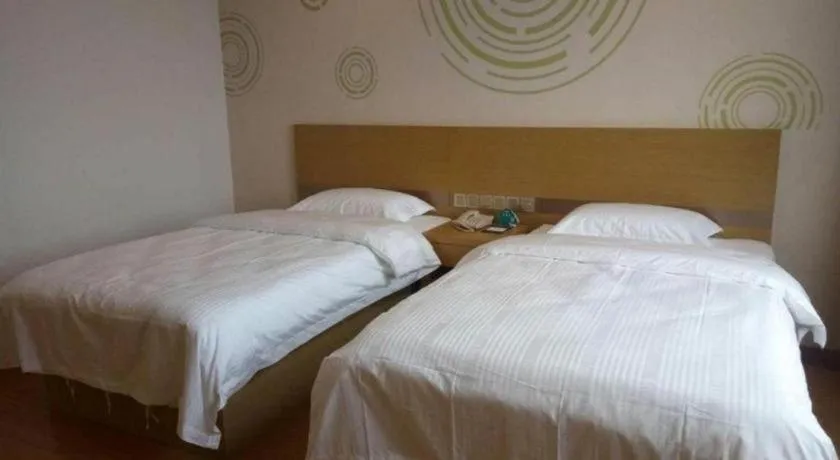 Bed in GreenTree Inn Qingdao Jiaozhou Jiaoping Road Express Hotel