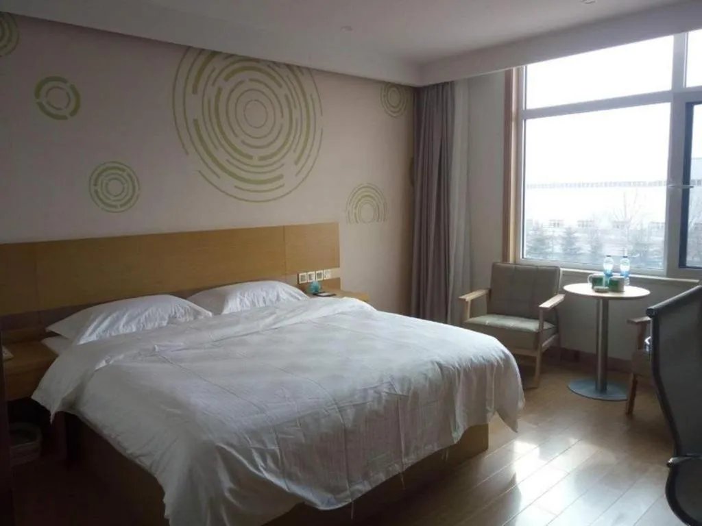 Bed in GreenTree Inn Qingdao Jiaozhou Jiaoping Road Express Hotel