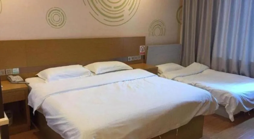 Bed in GreenTree Inn Qingdao Jiaozhou Jiaoping Road Express Hotel