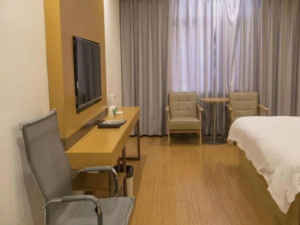 Bed in GreenTree Inn Qingdao Jiaozhou Jiaoping Road Express Hotel