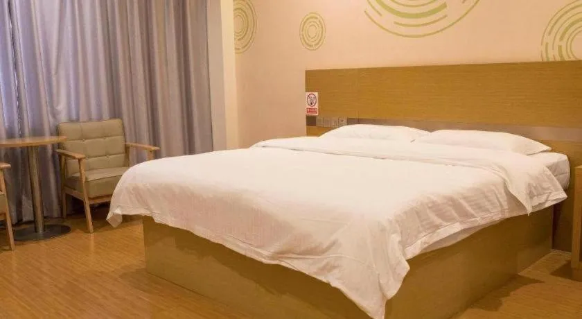 Bed in GreenTree Inn Qingdao Jiaozhou Jiaoping Road Express Hotel