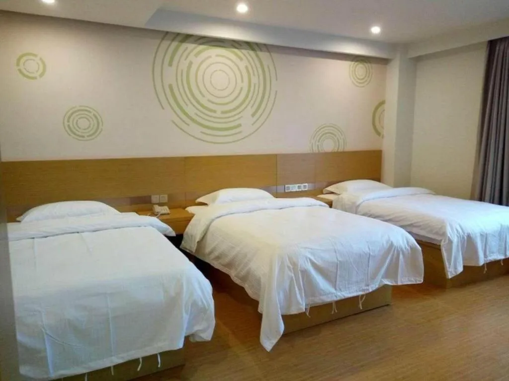 Bed in GreenTree Inn Qingdao Jiaozhou Jiaoping Road Express Hotel