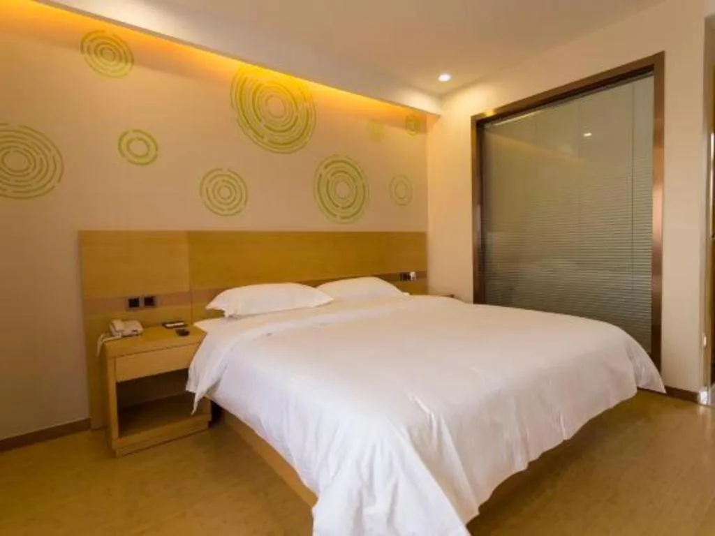 Bed in GreenTree Inn Zhangjiagang Yangshe Old Street Stadium