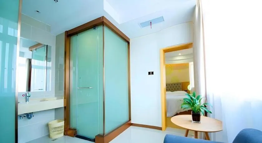 Bed in GreenTree Inn Zhangjiagang Yangshe Old Street Stadium