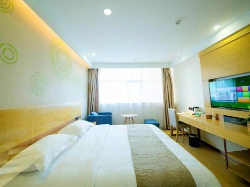 Bed in GreenTree Inn Zhangjiagang Yangshe Old Street Stadium