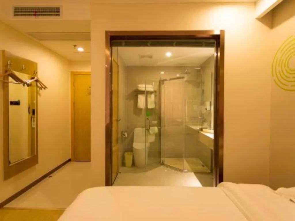 Bed in GreenTree Inn Zhangjiagang Yangshe Old Street Stadium