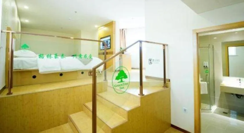 Bed in GreenTree Inn Zhangjiagang Yangshe Old Street Stadium