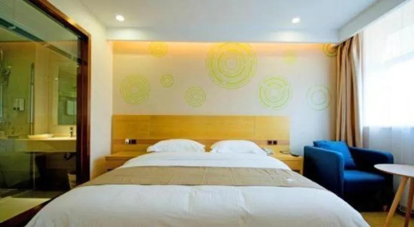 Bed in GreenTree Inn Zhangjiagang Yangshe Old Street Stadium