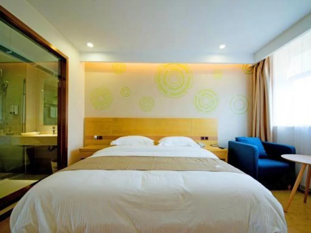 Bed in GreenTree Inn Zhangjiagang Yangshe Old Street Stadium
