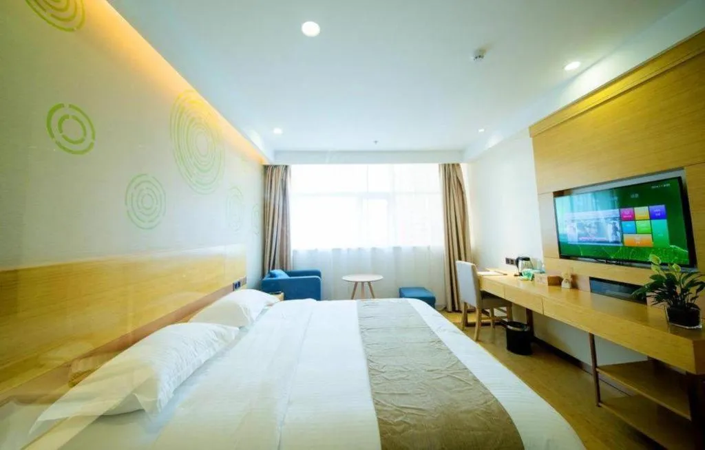 Bed in GreenTree Inn Zhangjiagang Yangshe Old Street Stadium