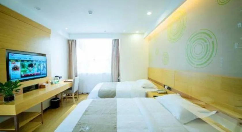 Bed in GreenTree Inn Zhangjiagang Yangshe Old Street Stadium